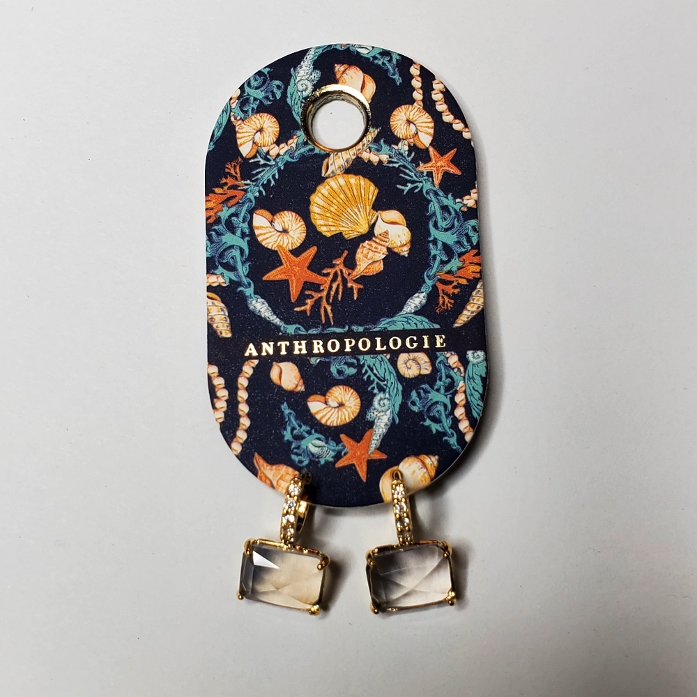 Anthropologie huggie gold tone earrings with clear stone New with tags